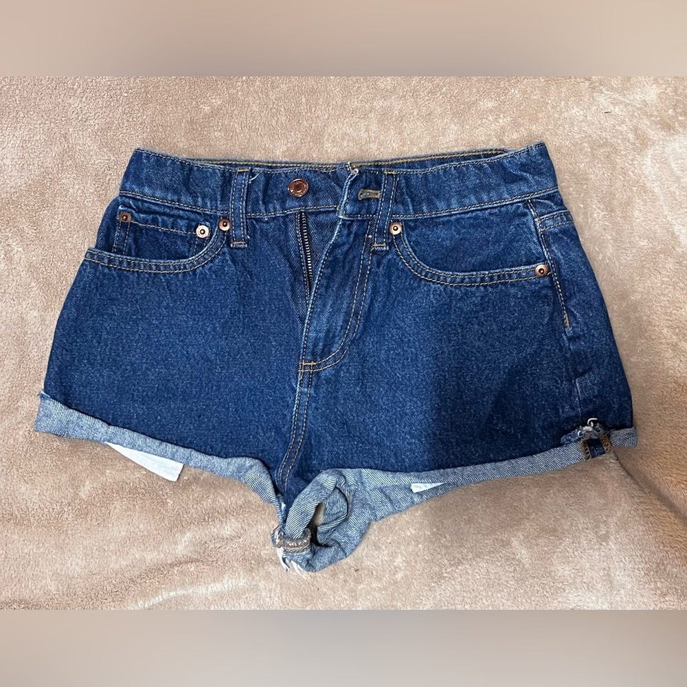 Pink cheeky denim shorts